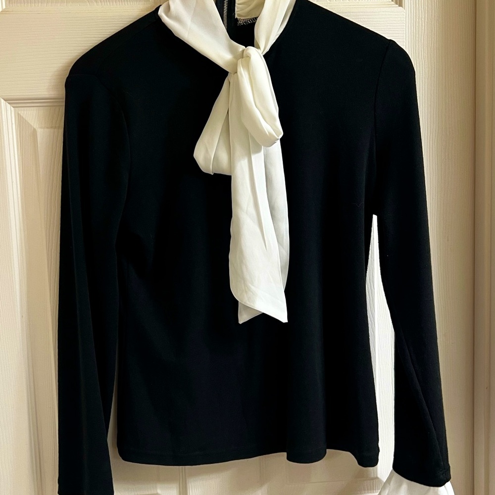 Sweater with lookalike blouse under